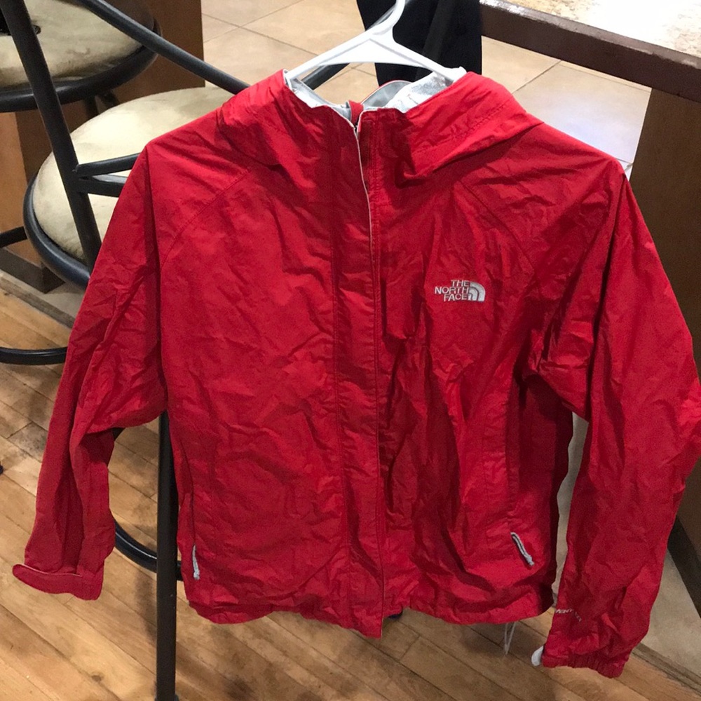 Red North Face rain jacket